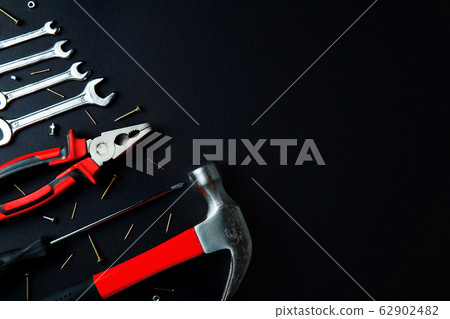Different construction tools. Maintenance and reparing concept. Place for text, flat lay. Different construction tools. Maintenance and reparing concept. Place for text, flat lay. 62902482
