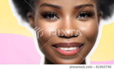 Pretty Afro Woman laughs happily, Face Close Up Pretty Afro Woman laughs happily, Face Close Up 62903740