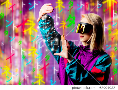 Blonde in VR glasses and 90s sport suit with 62904082