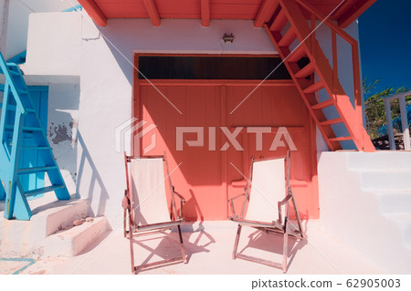 Beach chairs at Klima fishing village on Milos Beach chairs at Klima fishing village on Milos 62905003