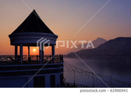 A view pavilion beside the Mekong River with 62906941