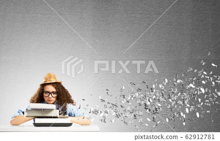 Creative inspiration of young female writer. 62912781