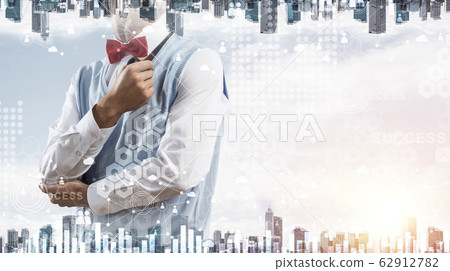 Conceptual image of successful businessman. Conceptual image of successful businessman. 62912782