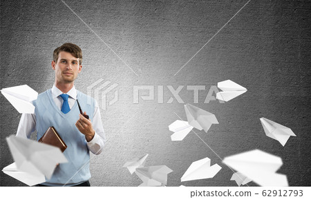 Conceptual image of young businessman. Conceptual image of young businessman. 62912793