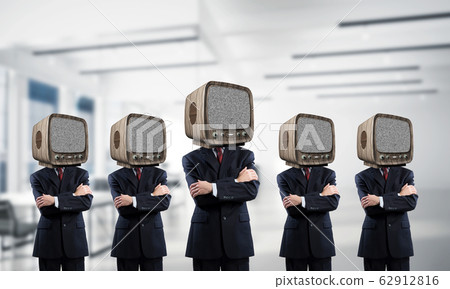 Businessmen with old TV instead of head. Businessmen with old TV instead of head. 62912816