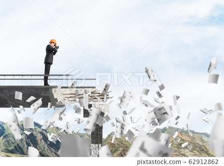 Man in suit looking up for new ideas. Man in suit looking up for new ideas. 62912862