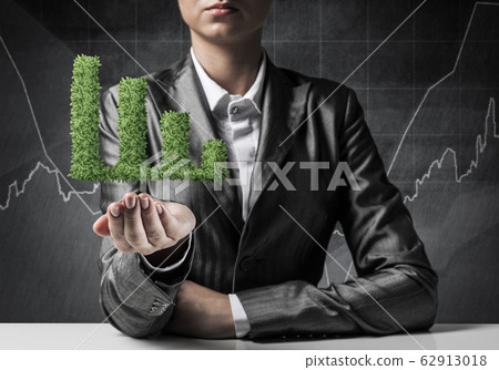 Businessman presenting growing graph. Businessman presenting growing graph. 62913018