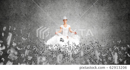 Young woman keeping mind conscious. 62913206