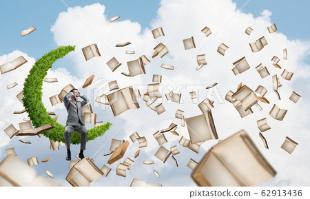 Young man in suit in blue sky dont want to hear anything Young man in suit in blue sky dont want to hear anything 62913436