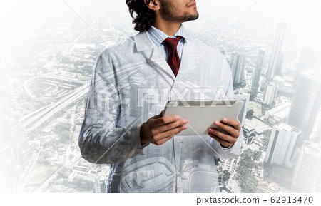 Medical industry concept by means of successful doctor Medical industry concept by means of successful doctor 62913470