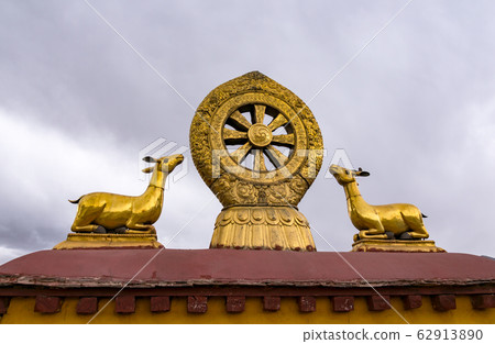 Rooftop Dharma wheel in Jokhang temple - Lhasa, 62913890