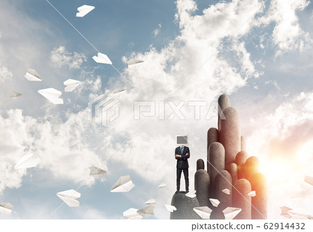 Businessman with monitor instead of head. 62914432