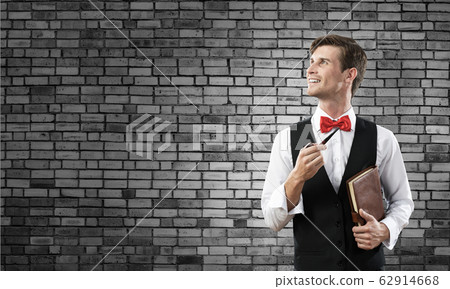 Conceptual image of young businessman. Conceptual image of young businessman. 62914668