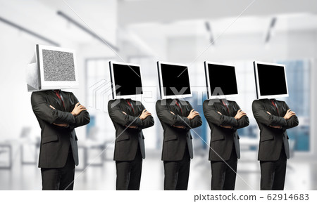 Businessmen with monitors instead of head. 62914683