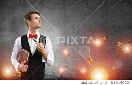 Conceptual image of young businessman. Conceptual image of young businessman. 62914690