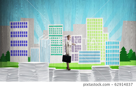 Successful confident business woman in suit. Successful confident business woman in suit. 62914837