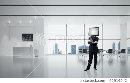 Businessman with TV instead of head. Businessman with TV instead of head. 62914942