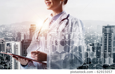 Contemporary medical industry presented by means of female docto Contemporary medical industry presented by means of female docto 62915057