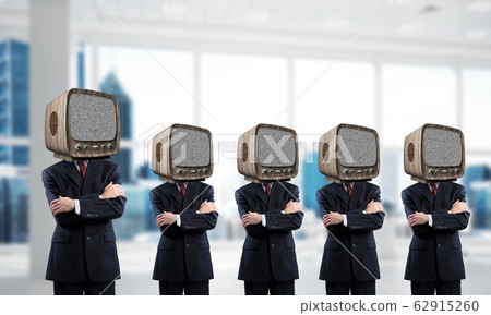 Businessmen with old TV instead of head. Businessmen with old TV instead of head. 62915260