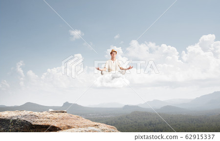 Young man keeping mind conscious. 62915337