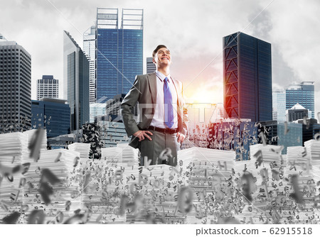 Successful confident businessman in suit. Successful confident businessman in suit. 62915518