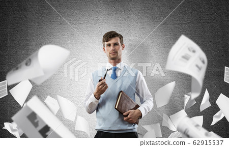 Conceptual image of young businessman. Conceptual image of young businessman. 62915537