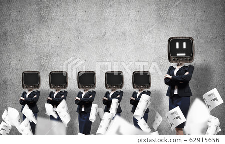 Business women with old TV instead of head. 62915656