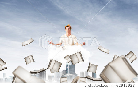 Young man keeping mind conscious. Young man keeping mind conscious. 62915928