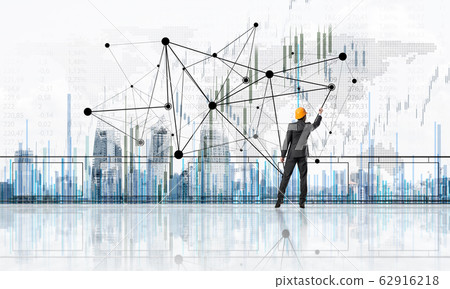 Sunrise above skyscrapers and engineer in helmet drawing globalization concept 62916218