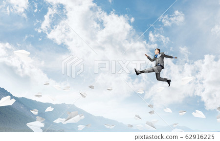 Businessman on the move. Businessman on the move. 62916225