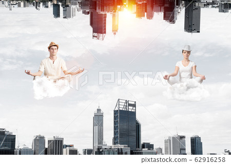 Young couple keeping mind conscious. Young couple keeping mind conscious. 62916258