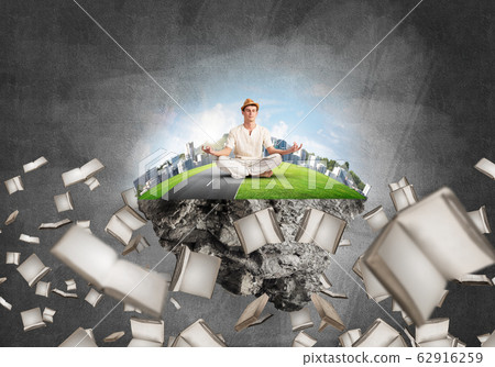 Young man keeping mind conscious. Young man keeping mind conscious. 62916259