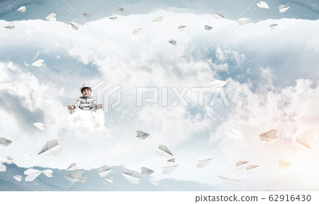 Young boy keeping mind conscious. Young boy keeping mind conscious. 62916430