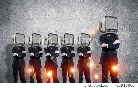Businessmen with old TV instead of head. Businessmen with old TV instead of head. 62916866