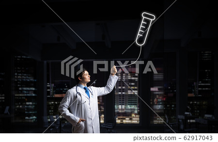 Doctor and medical vial symbol 62917043