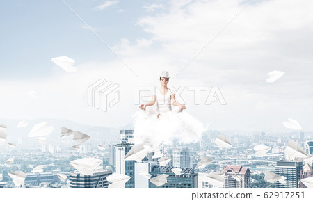 Young woman keeping mind conscious. 62917251