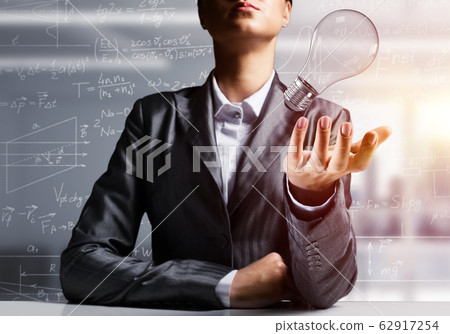 Concept of lightbulb as symbol of new idea. 62917254