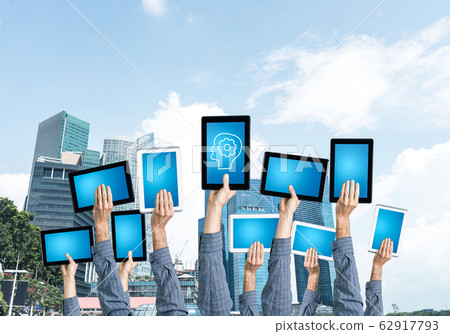 Close of man hands in line showing tablet pc with blank blue scr Close of man hands in line showing tablet pc with blank blue scr 62917793