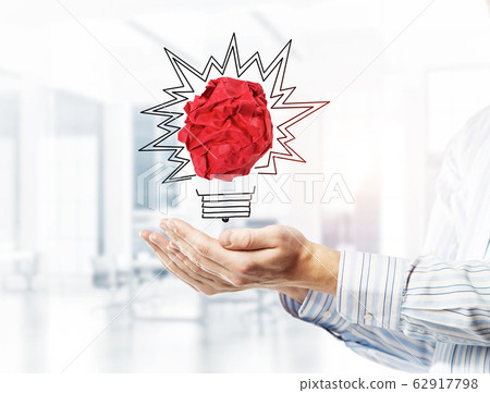 Concept of idea and inspiration presented by paper crumped ball. 62917798