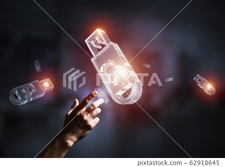 Concept of information storage and security with flash stick icon. Mixed media Concept of information storage and security with flash stick icon. Mixed media 62918645