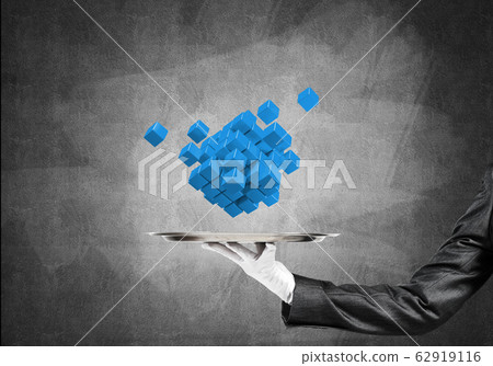 Hand of waitress presenting cubes on tray. Hand of waitress presenting cubes on tray. 62919116