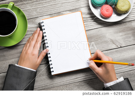 Businesswoman making some notes 62919186