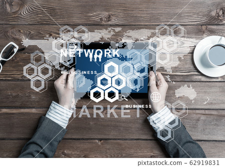 Business workplace with tablet device coffee cup and media user interface Business workplace with tablet device coffee cup and media user interface 62919831