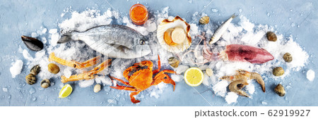 Fish and seafood overhead panoramic shot. Sea bream, scallop, crab, squid, clams and prawns 62919927