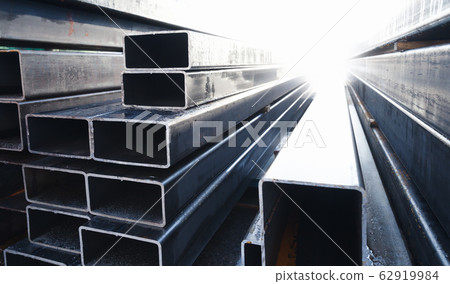 Stack of rolled metal products is in a storage Stack of rolled metal products is in a storage 62919984