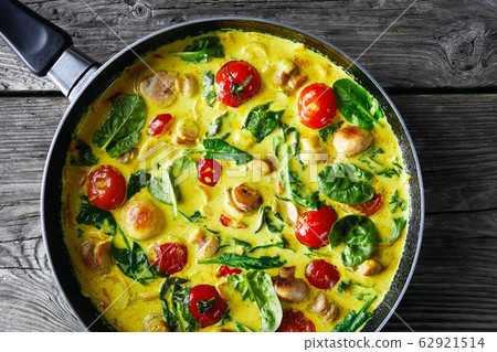 Top view on yellow coconut and mushroom curry 62921514