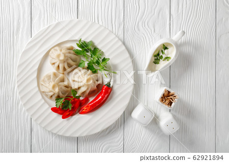 a portion of Khinkali on a plate a portion of Khinkali on a plate 62921894