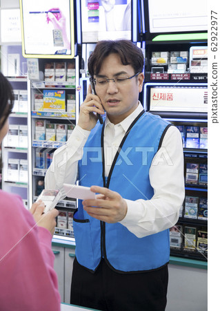 Portrait of young woman and man, part timer and owner 494 Portrait of young woman and man, part timer and owner 494 62922977