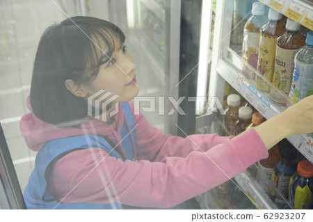 Portrait of young woman and man, part timer and owner 398 62923207