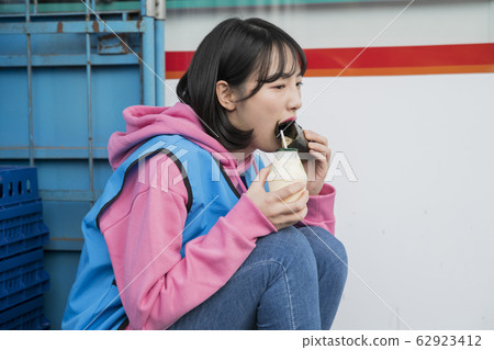 Portrait of young woman and man, part timer and owner 582 62923412